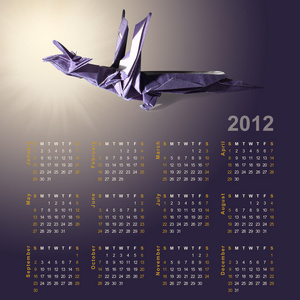 2012 年龙的象征由纸 折纸 和日程表