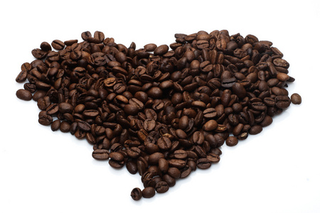 堆的咖啡作物在心的形状图片