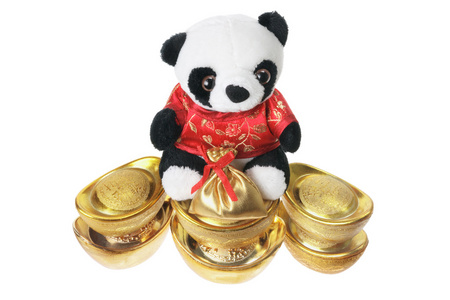 毛绒玩具熊猫和金锭