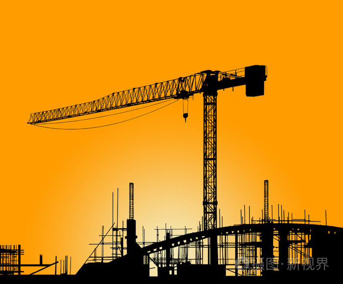 建筑施工现场塔式起重机的剪影