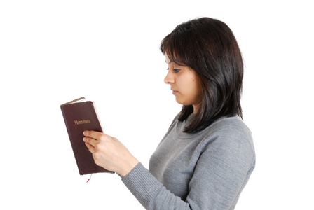 学习圣经的年轻商业女人