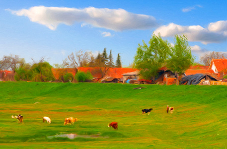 显示小房子 草甸和奶牛的乡村风景