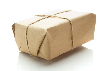 孤立的棕色牛皮纸包好的包裹照片