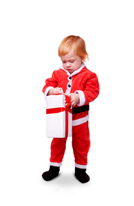红色套件的圣诞老人孤立的小可爱宝宝的肖像