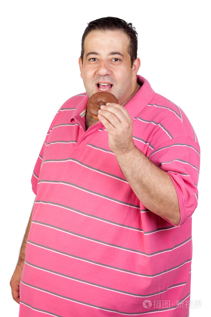 胖男人吃一块巧克力松饼