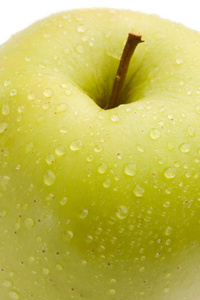 绿色美味苹果用反射的宏