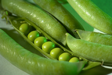 Pea n a green background