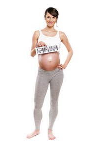 孕妇期待新生儿和持有超声