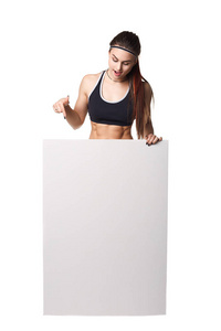 运动健身女人与标志板空白健康运动分离白色背景黑色衣服