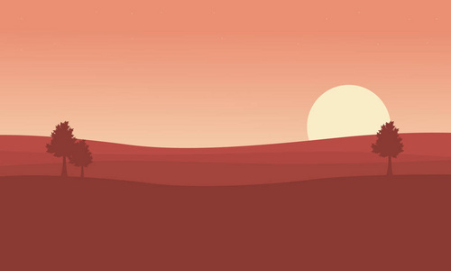 沙漠和在日落景观树的剪影图片