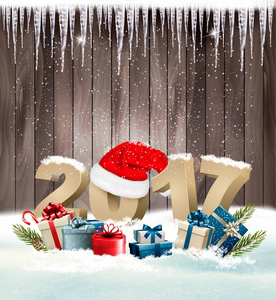 快乐的新年背景与 2017年和礼品盒。矢量