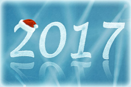 在圣诞帽子雪与光线的数字 (2017年照片