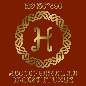 美丽的金色卷发字母和数字初始会标在装饰轮架。标志设计的时尚字体工具包