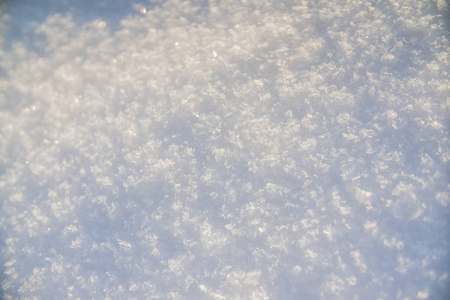 背景闪闪发光的新鲜白雪