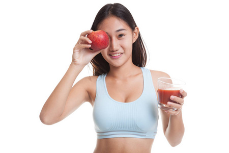 番茄汁和苹果的漂亮健康亚洲女孩