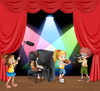 交响乐团在舞台上孩子们在舞台上演奏音乐乐队与卡通儿童在舞台缮 