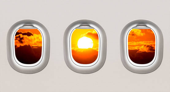 夕阳从飞机窗户看