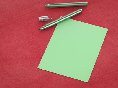 绿空白纸的绿色钢笔