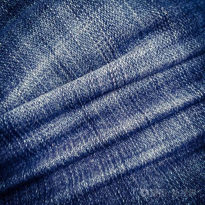 蓝色牛仔裤纹理背景和阴影