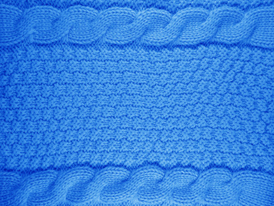 针织的羊毛背景浅蓝色