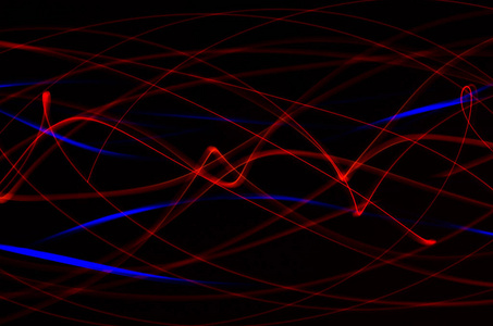抽象 红色和蓝色的线条，在黑色的背景