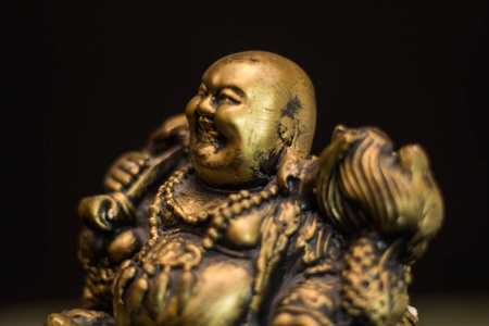 中国雕像何泰, 笑佛是繁荣的象征