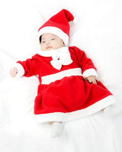 圣诞老人服装的可爱小女孩的画像。孤立对 w