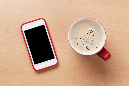 咖啡杯和智能手机