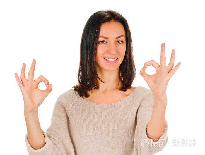 年轻的女士表示ok的手势