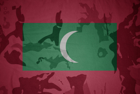 马尔代夫的卡其色纹理上的标志。军事概念