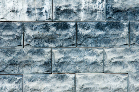 纹理背景。 装饰砖建筑装饰。 一种小的长方形块，通常由烧制或晒干的粘土制成，用于建筑。