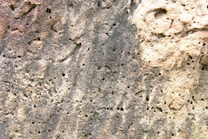 质地砂岩背景天然石材砂岩以大棕色固体粗糙地面为特征。