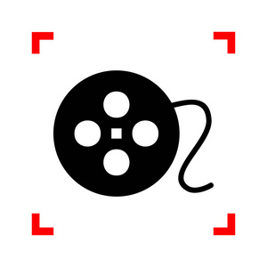 电影的圆形标志。在焦点的角落里，在白色背景上的黑色图标