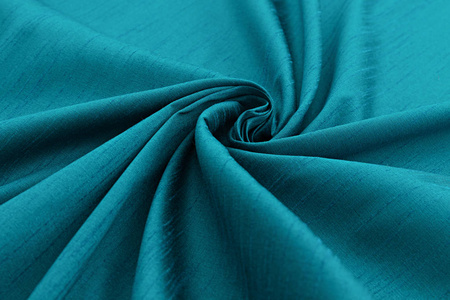 绿松石背景豪华型布或波浪褶皱的 grunge 丝绸质地缎