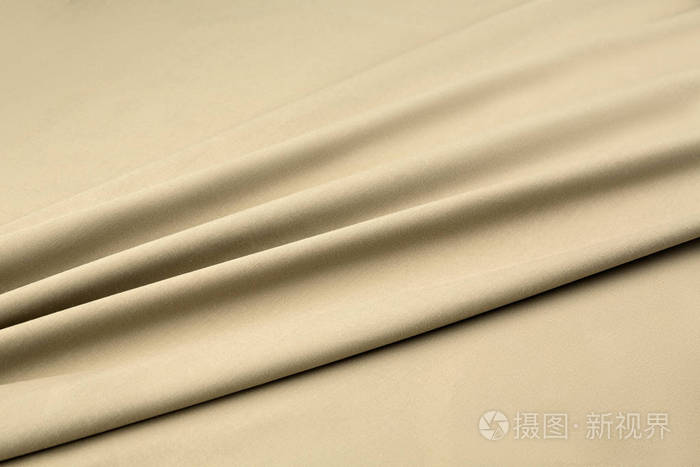 黄色背景豪华型布或波浪褶皱的 grunge 丝绸质地缎天鹅绒