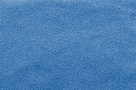 鸣笛声壁纸带纹理的背景的牛仔布面料淡蓝色照片