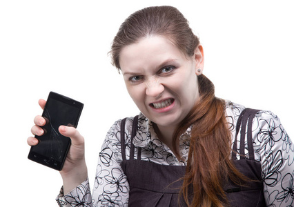 愤怒的女人，与裂纹智能手机