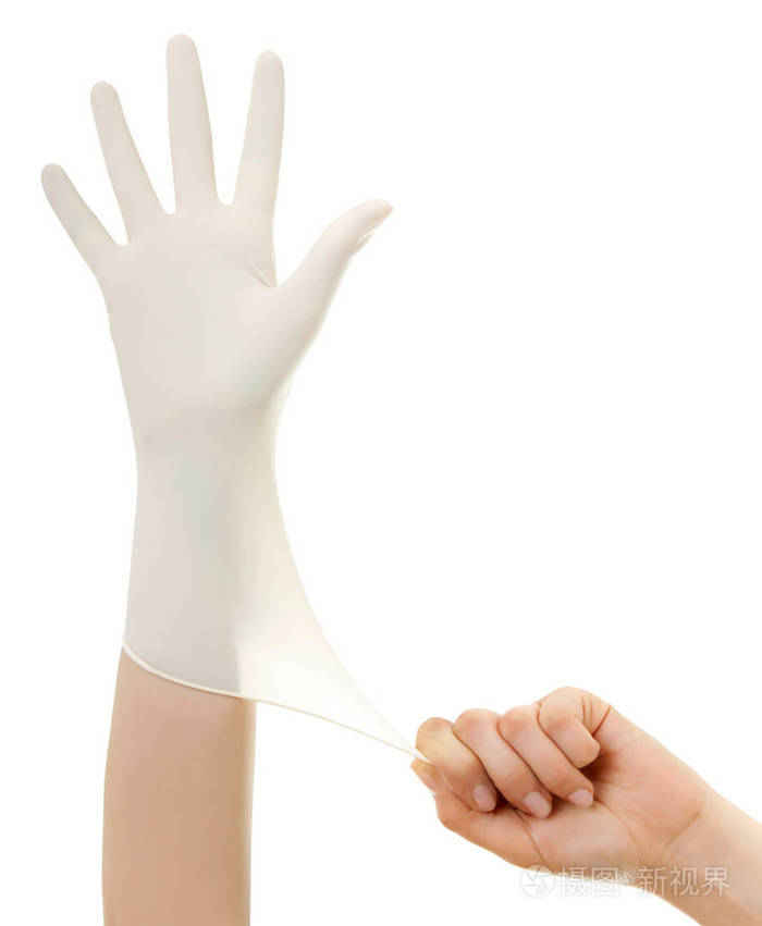 医生带上白色孤立的无菌手套的手.医疗