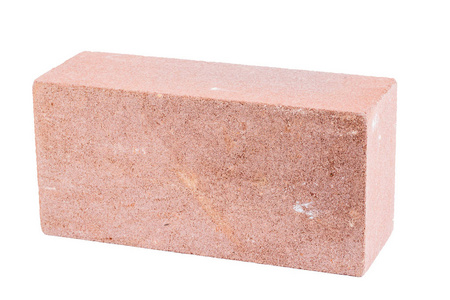 一砖穿孔孤立在白色背景照片