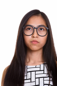 思考的年轻亚洲青少年书呆子女孩的脸