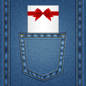 名片，上面有红色礼品蝴蝶结牛仔布背景上丝带