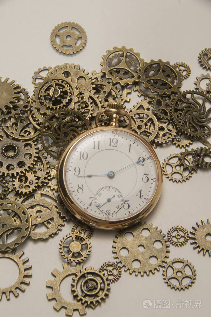 怀表和齿轮照片-正版商用图片0xsrsv-摄图新视界