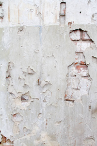 旧砖石在古代水泥上的复古背景结构与旧油漆的痕迹裂缝