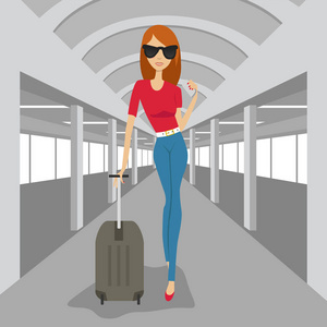 时尚女人带着手提箱走在机场