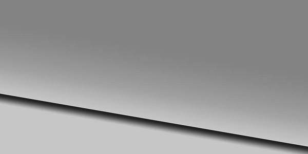 灰色梯度背景下的中性表面金属板摄影图