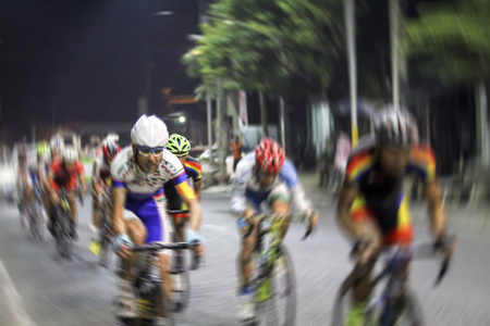 模糊骑自行车亚锦赛赛程为背景图片