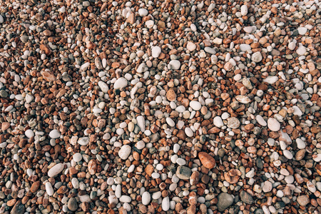 在海滩上的鹅卵石。海边的纹理。亚德里亚海