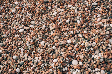 在海滩上的鹅卵石。海边的纹理。亚德里亚海