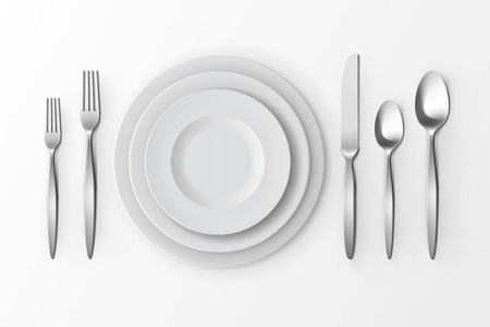 矢量餐具的银叉子勺子和刀用板顶视图在白色背景上。表设置