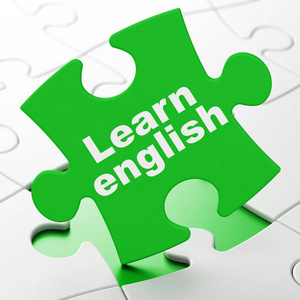 教育理念 拼图背景上学习英语